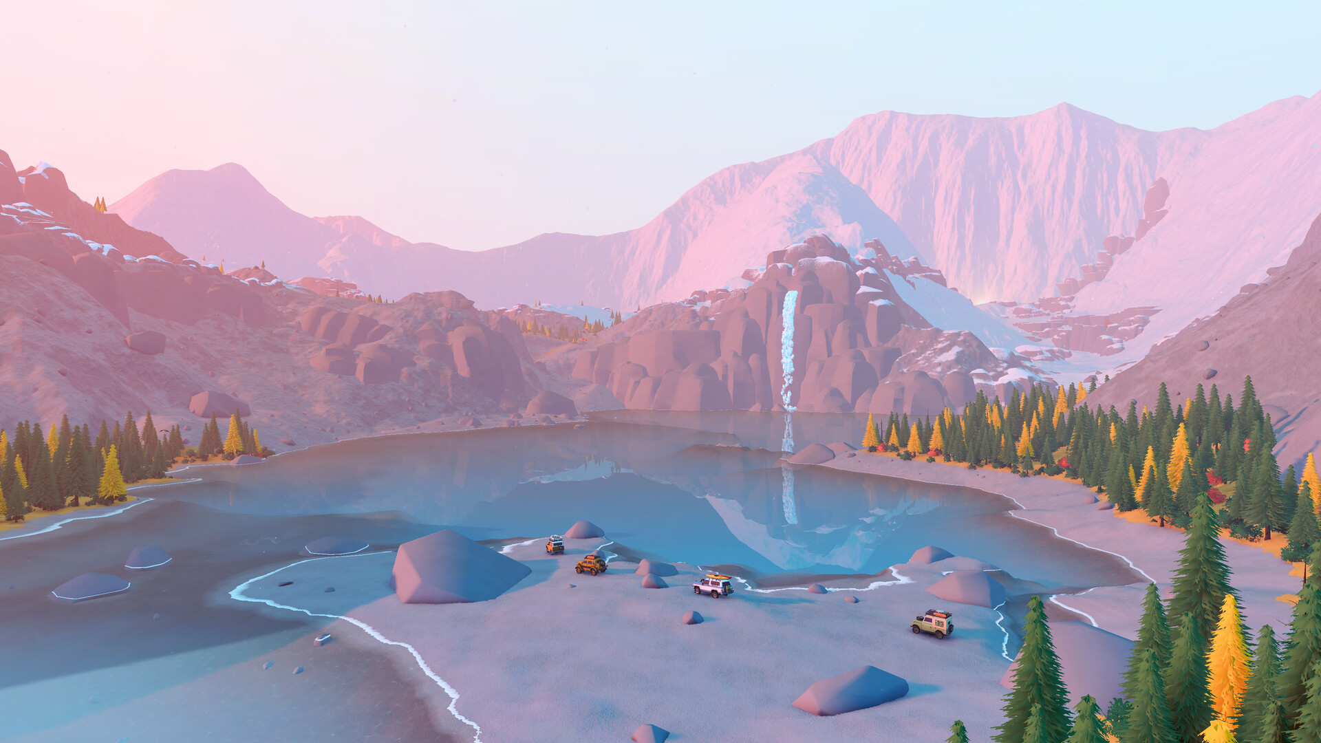 Vehicles beside a mountain lake